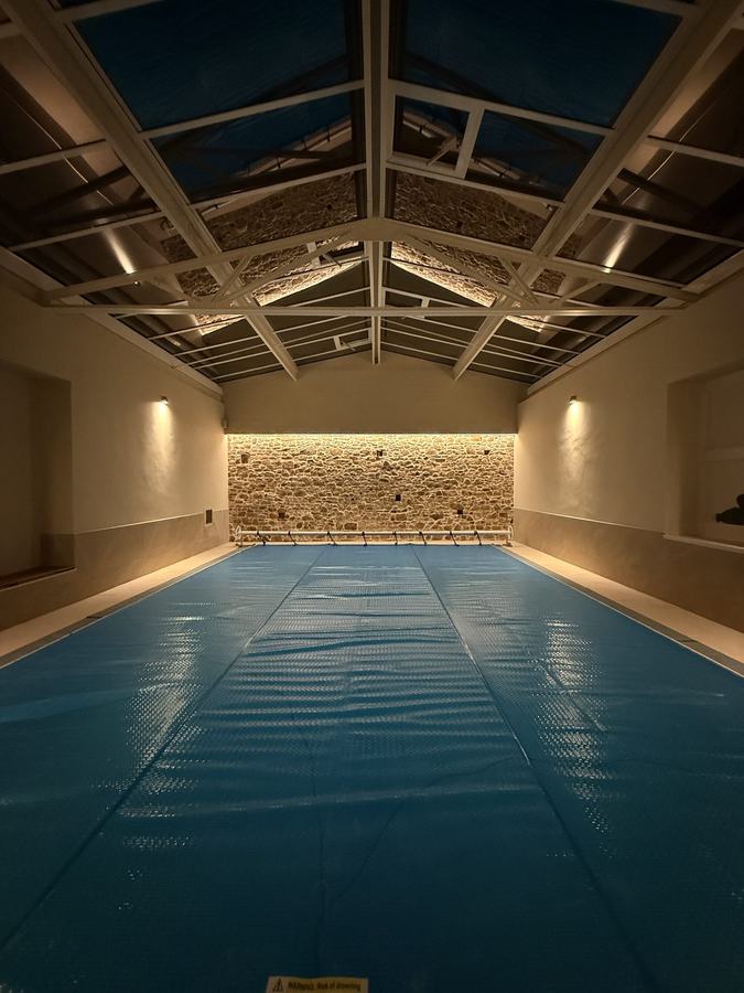 Hamptonne House indoor pool room, night shot, Jersey